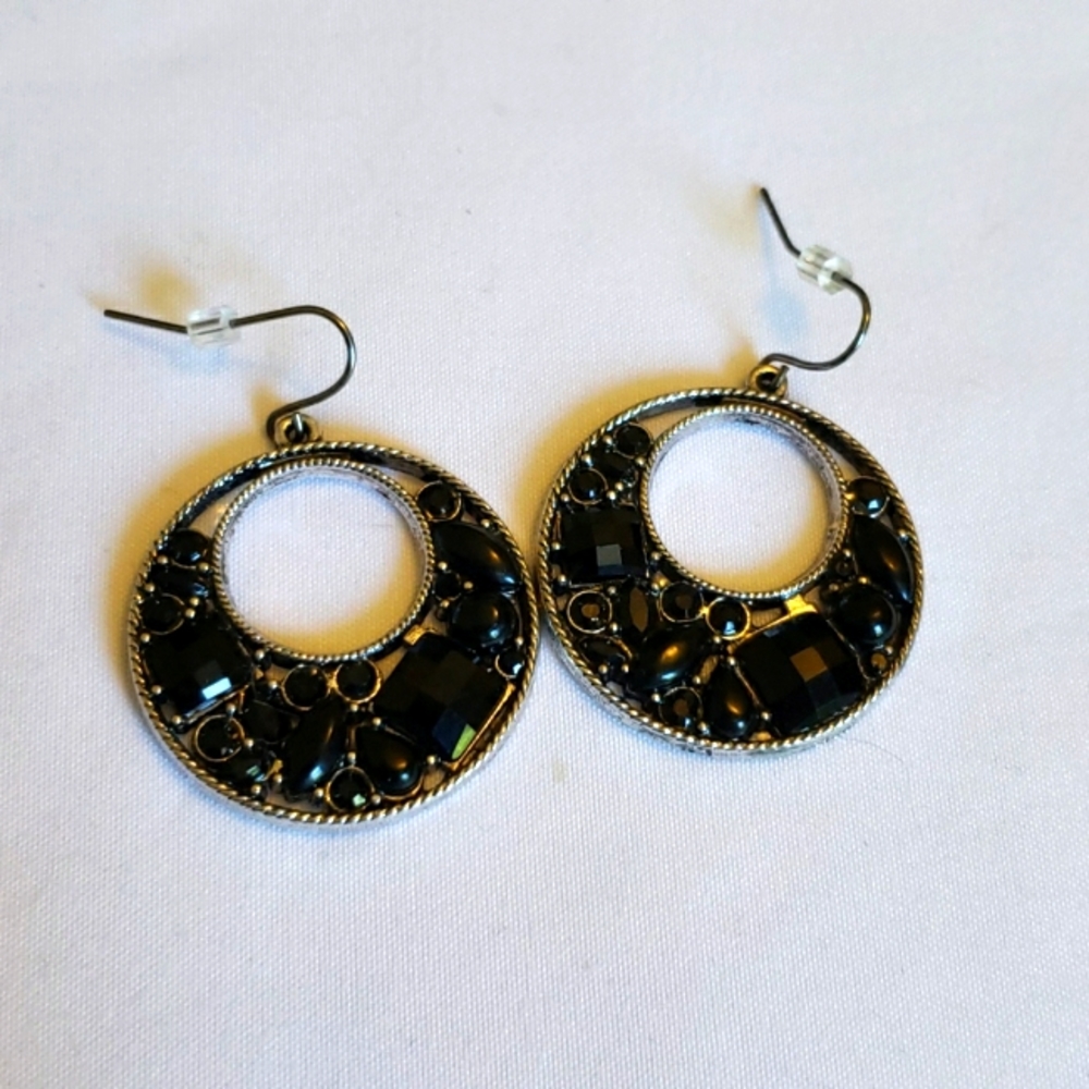 Round black earrings